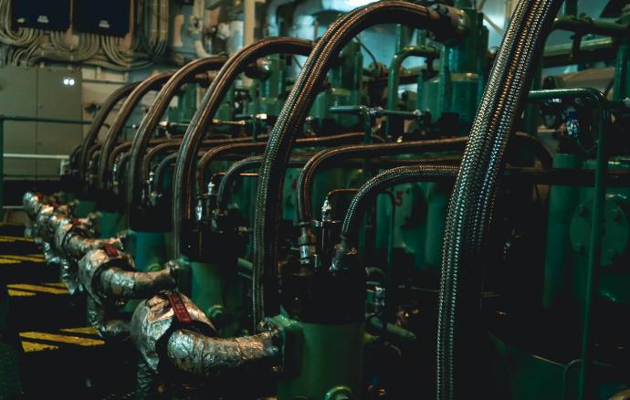 a row of pipes lined up in a factory